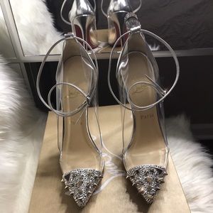 **Authentic CLB Clear Spikes Silver Heels **